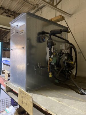 Brock 27-inch 10 HP liquid propane heater with galvanized housing and burner assembly on a warehouse shelf.