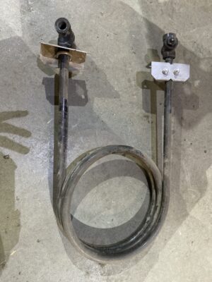Used Brock in‑line heater vaporizer coil with looped tubing and welded mounting brackets.
