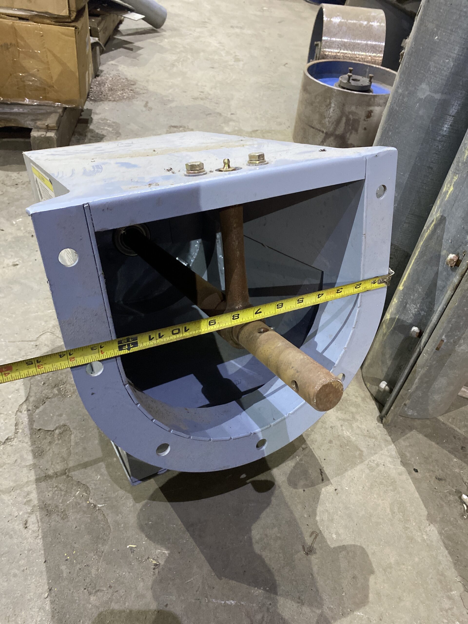 Front view of the Norstar power head showing a 1.25-inch output shaft and measuring tape across the opening.