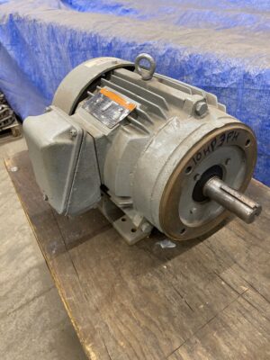 Front view of the Tatung 10HP motor showing the C‑face mounting flange and exposed steel output shaft with light rust.