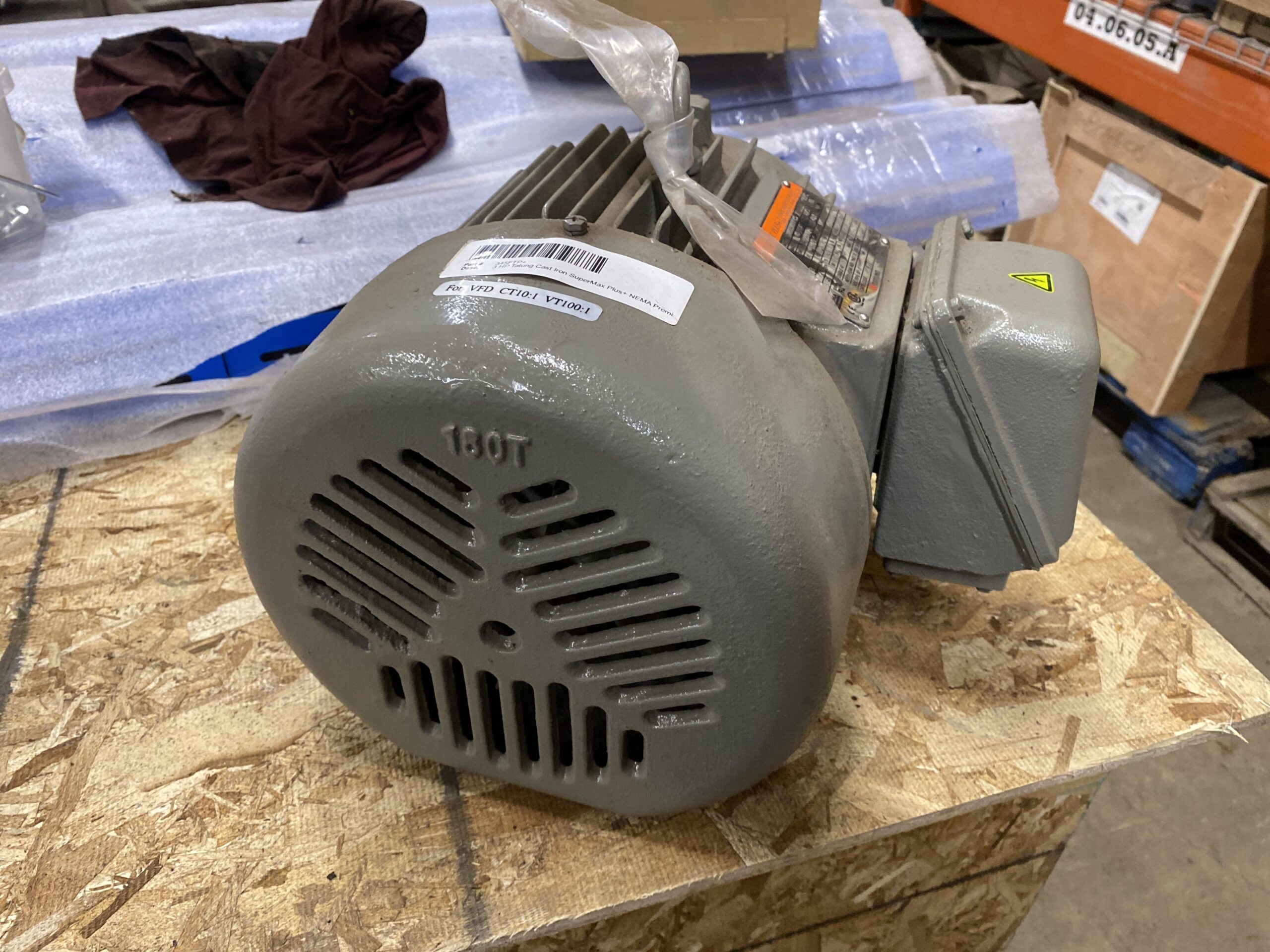 Rear view of a Tatung 3 HP inverter‑duty electric motor showing the cooling fan shroud and cast‑iron housing.