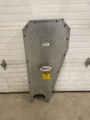 Full view of a Lambton galvanized belt guard standing upright against a wall.